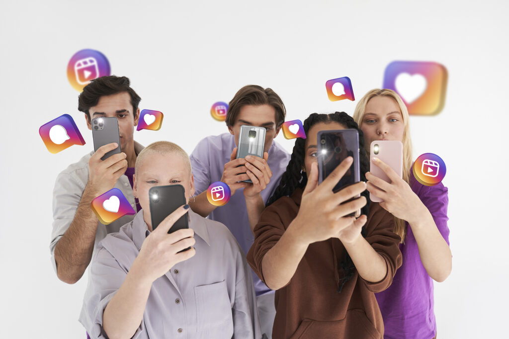Micro-influencers using their phones to create and promote their content.